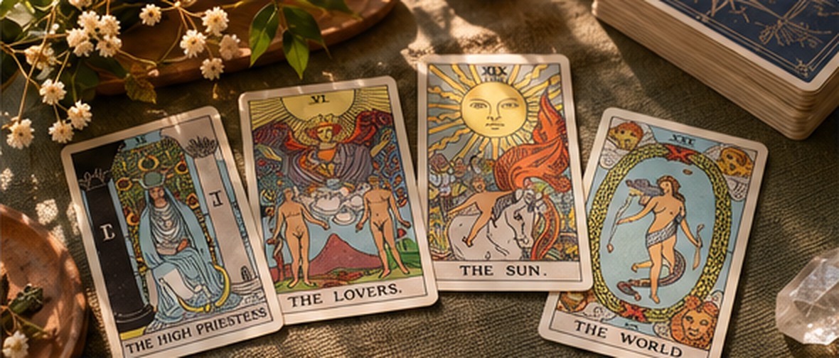 Several illustrated tarot cards in warm light